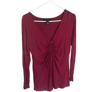White House Black Market Burgundy top. V neck with a gathered front. Size Med